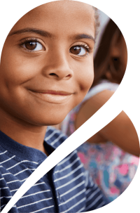 Bixal Logo letter B silhouette around a photo of a smiling child.